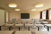 Bright classroom with wooden surfaces